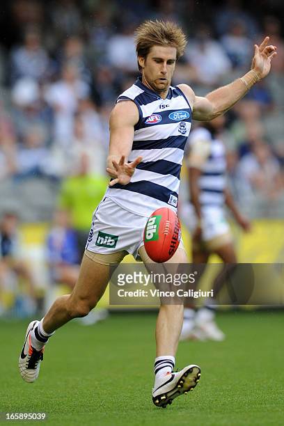 Tom Lonergan kicks the ball during the round two AFL match between the Geelong Cats and the North Melbourne Kangaroos at Etihad Stadium on April 7,...