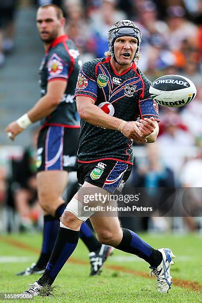 Todd Lowrie of the Warriors offloads the ball during the round 5 NRL match between the New Zealand Warriors and the South Sydney Rabbitohs at Mt...