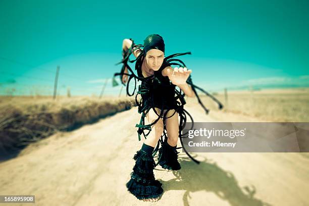 eccentric female surreal alien fashion - surreal desert stock pictures, royalty-free photos & images