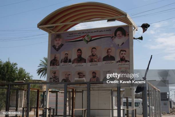 Photos of martyred militia supporters of Muqtada al-Sadr appear on the streets in Sadr City on March 18, 2023 in Baghdad, Iraq. Sadr City is the...