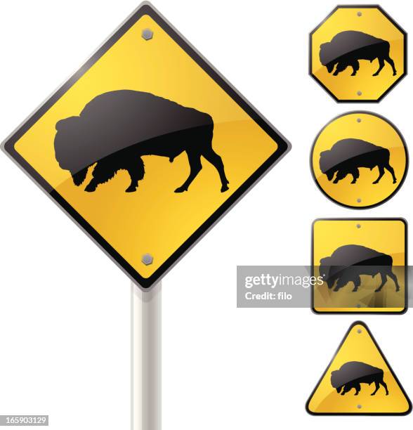 buffalo crossing sign - african buffalo stock illustrations