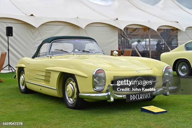 Yellow 1958 Mercedes-Benz 300 SL Roadster is displayed during the Salon Privé 2023 at Blenheim Palace on September 01, 2023 in Woodstock, England....