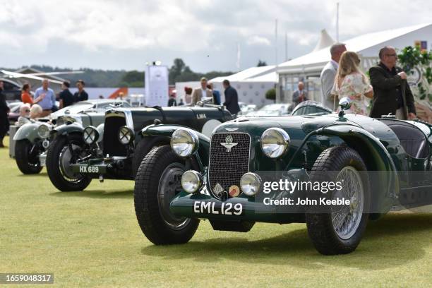 Vintage Aston Martin Mk2 and a Aston Martin Speed Model chassis number 707 known as the Spar Special are displayed during the Salon Privé 2023 at...