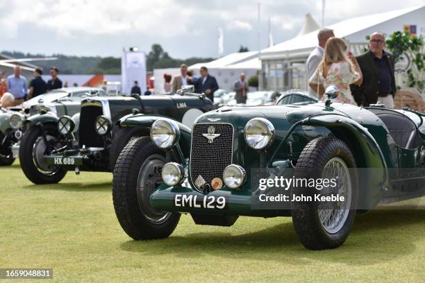 Vintage Aston Martin Mk2 and a Aston Martin Speed Model chassis number 707 known as the Spar Special are displayed during the Salon Privé 2023 at...
