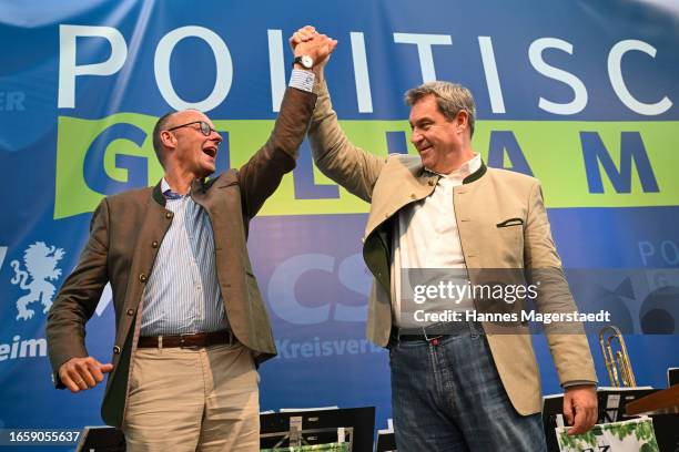 Markus Soeder, Premier of Bavaria and leader of the Bavarian Christian Democrats , and Friedrich Merz , leader of the German Christian Democrats ,...