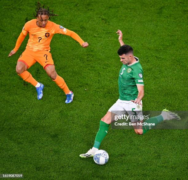 Dublin , Ireland - 10 September 2023; John Egan of Republic of Ireland and Xavi Simons of Netherlands during the UEFA EURO 2024 Championship...