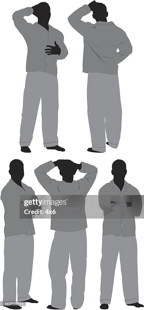 Man standing in pajamas