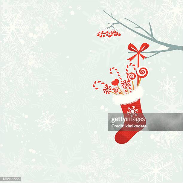 weihnachts-socken mit zuckerstangen - wool stock-grafiken, -clipart, -cartoons und -symbole