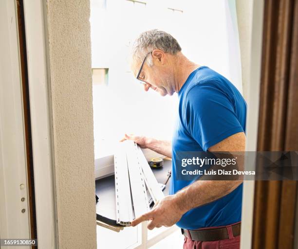 windows blind repair, replacement of mobile slats that were. - replacement windows stock pictures, royalty-free photos & images