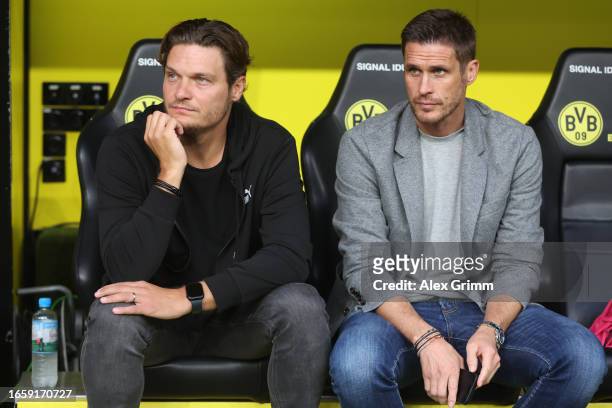 Head coach Edin Terzic and sporting director Sebastian Kehl of Borussia Dortmund look on prior to the Bundesliga match between Borussia Dortmund and...