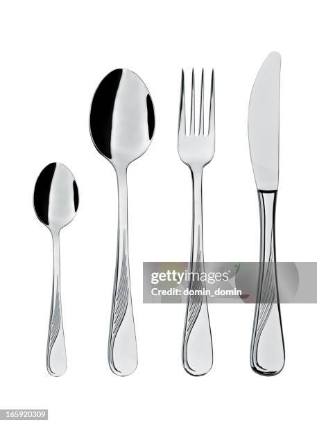 everyday use steel cutlery, teaspoon, spoon, fork, knife, isolated white - teaspoon stock pictures, royalty-free photos & images
