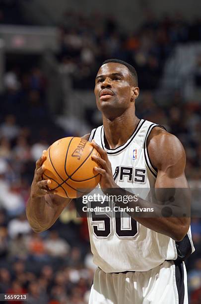 David Robinson of the San Antonio Spurs shoots a free throw during the game against the Golden State Warriors at SBC Center on November 5, 2002 at...