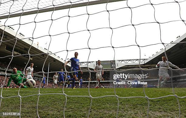 Gylfi Sigurdsson of Tottenham Hotspur scores their second goal during the Barclays Premier League match between Tottenham Hotspur and Everton at...