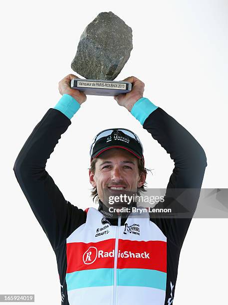 Fabian Cancelllara of Switzerland and Radioshack Leopard celebrates winning the 2013 Paris - Roubaix race from Compiegne to Roubaix on April 7, 2013...