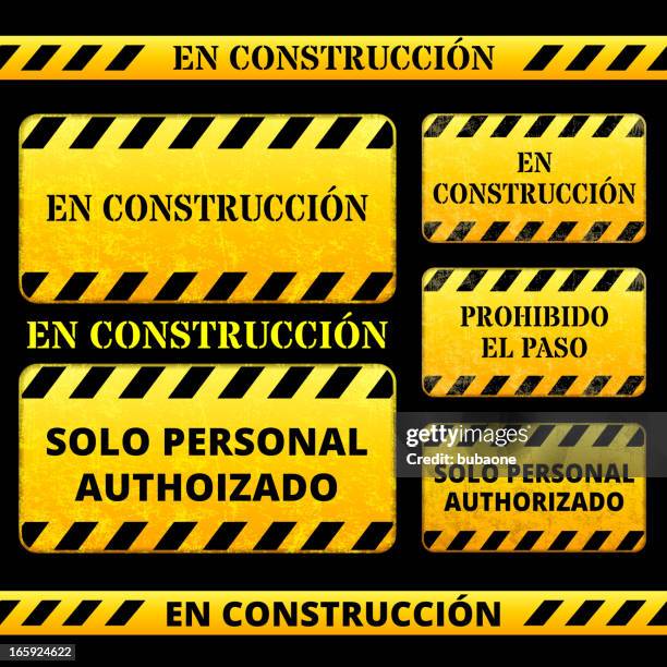 under construction street sign in spanish - safety banners for construction site stock illustrations