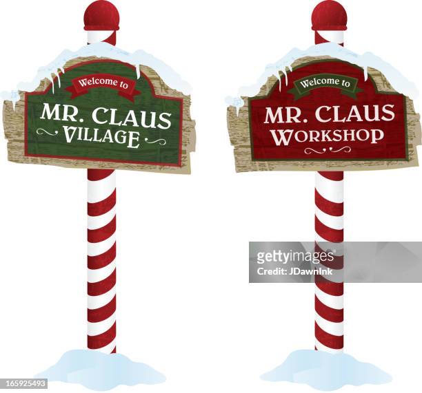 christmas and holiday wooden workshop village signs - santas workshop stock illustrations