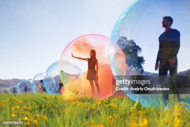 inside bubble spheres - people inside bubbles stock-fotos und bilder