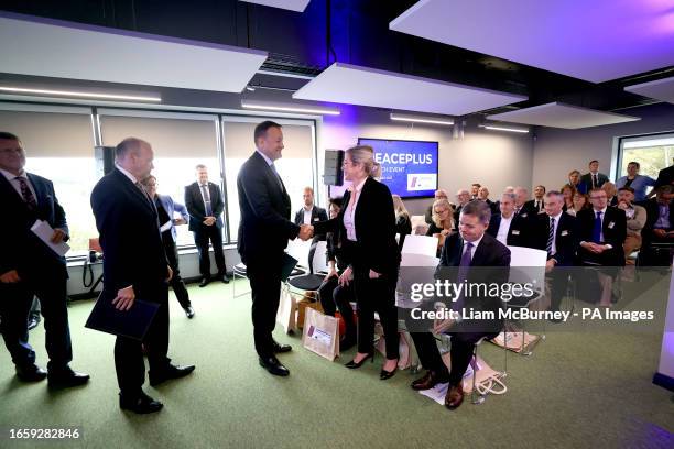 Irish premier Leo Varadkar greets Sinn Fein Stormont leader Michelle O'Neill, as Northern Ireland Secretary Chris Heaton-Harris and European...