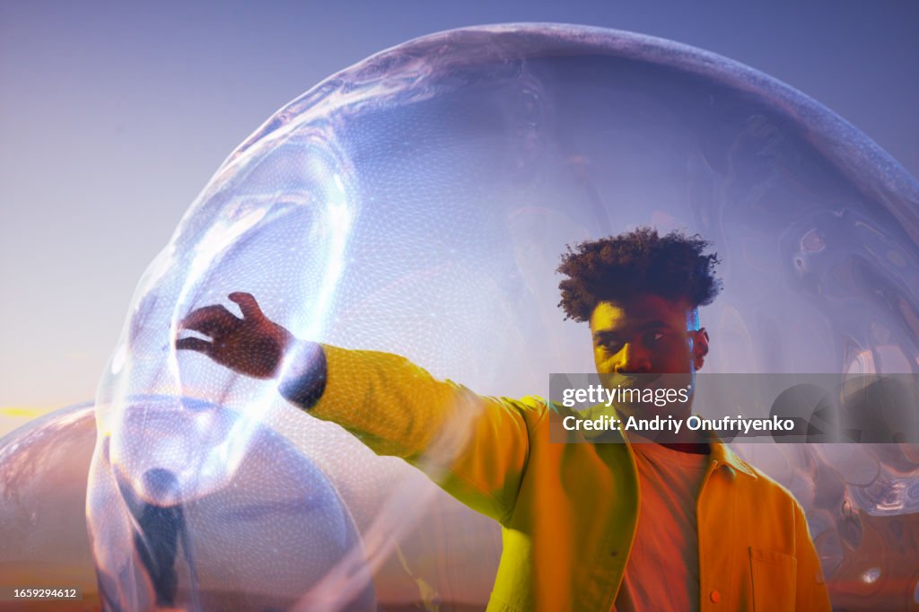 Man Inside Sphere Inside Bubble Spheres High-Res Stock Photo - Getty Images