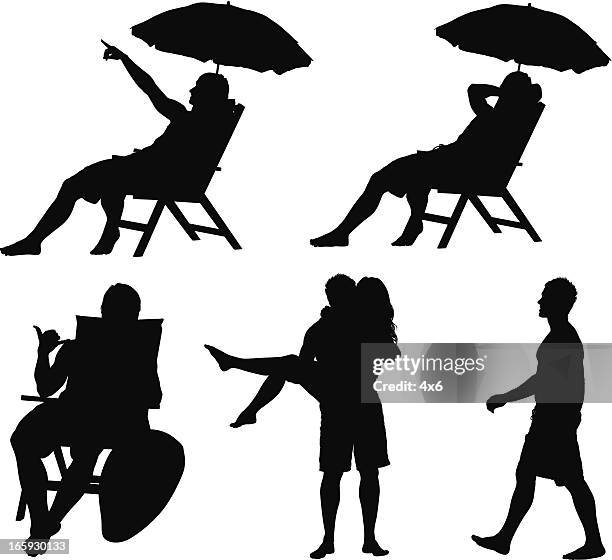 silhouette von menschen am vacations - liegestuhl freisteller stock-grafiken, -clipart, -cartoons und -symbole