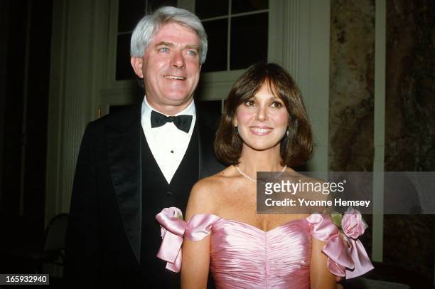 Phil Donohue and Marlo Thomas pose for a photograph at Gloria Steinem's 50th birthday celebration May 23, 1984 in New York City.