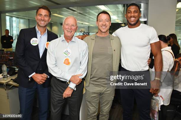Eddie Hearn, Barry Hearn, John Terry and Anthony Joshua attend the BGC Group Charity Day on behalf of Haven House Children's Hospice & Saint Francis...