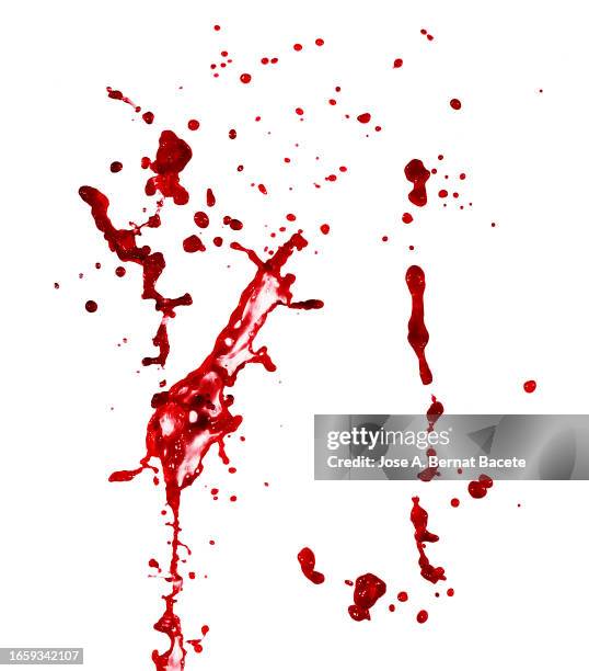 splashes and drops of a stream of blood on a white background. - blood flow photos et images de collection