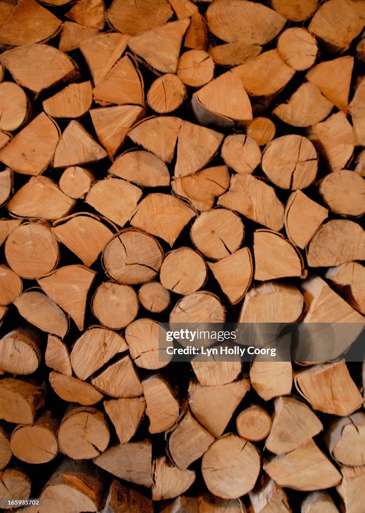 Wooden logs piled in a stack