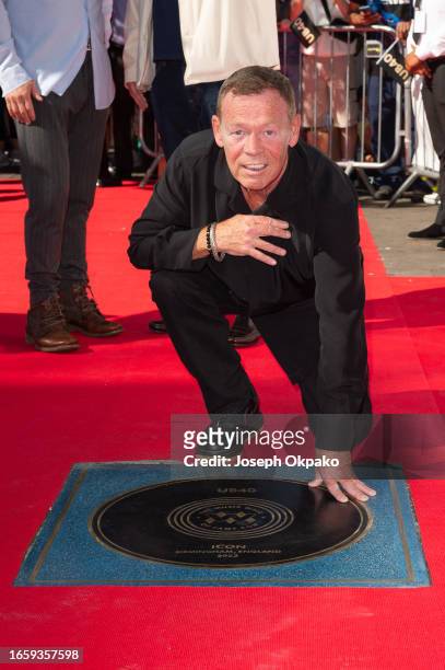 Ali Campbell OF UB40 poses next to UB40's Music Walk of Fame plaque at the unveiling of The Music Walk Of Fame 2023 at Camden on September 04, 2023...