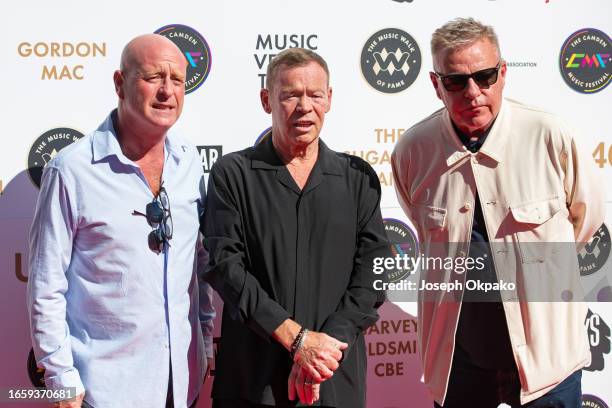 Lee Bennett, Ali Campbell and Graham McPherson aka Suggs of Madness attend the unveiling of The Music Walk Of Fame 2023 at Camden on September 04,...