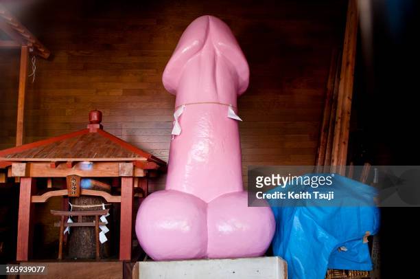 Phallic-shaped statue sits in the storage at Kanamara Matsuri on April 7, 2013 in Kawasaki, Japan. The festival is held annually on the first Sunday...