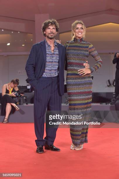 Itaian actor Francesco Montanari and Federica Sorino at the 80 Venice International Film Festival 2023. Red carpet Filming Italy Best Movie Award....