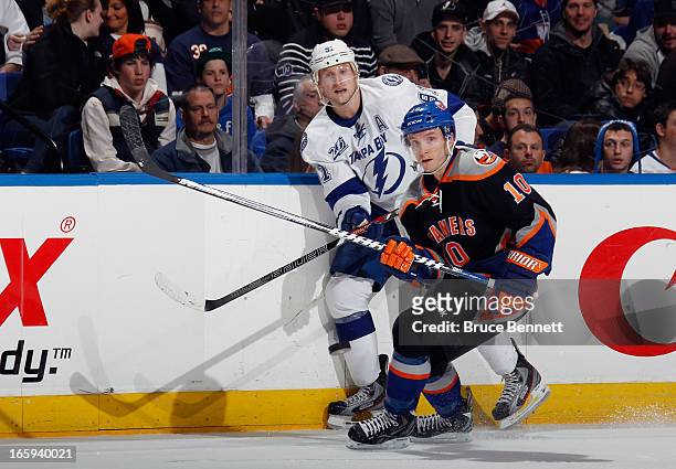 Keith Aucoin of the New York Islanders skates against the Tampa Bay Lightning at the Nassau Veterans Memorial Coliseum on April 6, 2013 in Uniondale,...