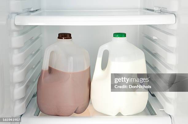 milk in refrigerator - gallon stock pictures, royalty-free photos & images
