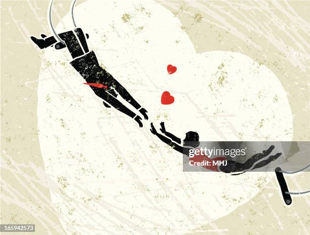 man catching a woman trapeze artist with hearts - trapeze artist stock illustrations