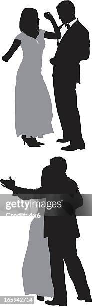 silhouette of a romantic couple dancing - romantic couple back stock illustrations