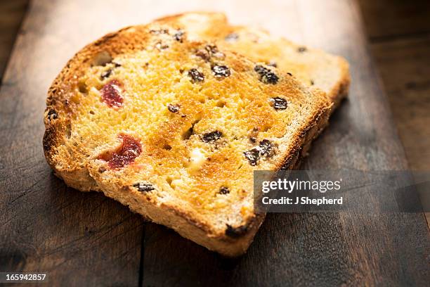toasted, butter fruit loaf - raisin toast stock pictures, royalty-free photos & images