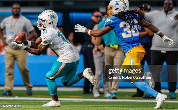 Inglewood, CA, Sunday, Sept. 10, 2023 - Miami Dolphins wide receiver Tyreek Hill hauls in a 47-yard pass over Los Angeles Chargers cornerback Ja'Sir...