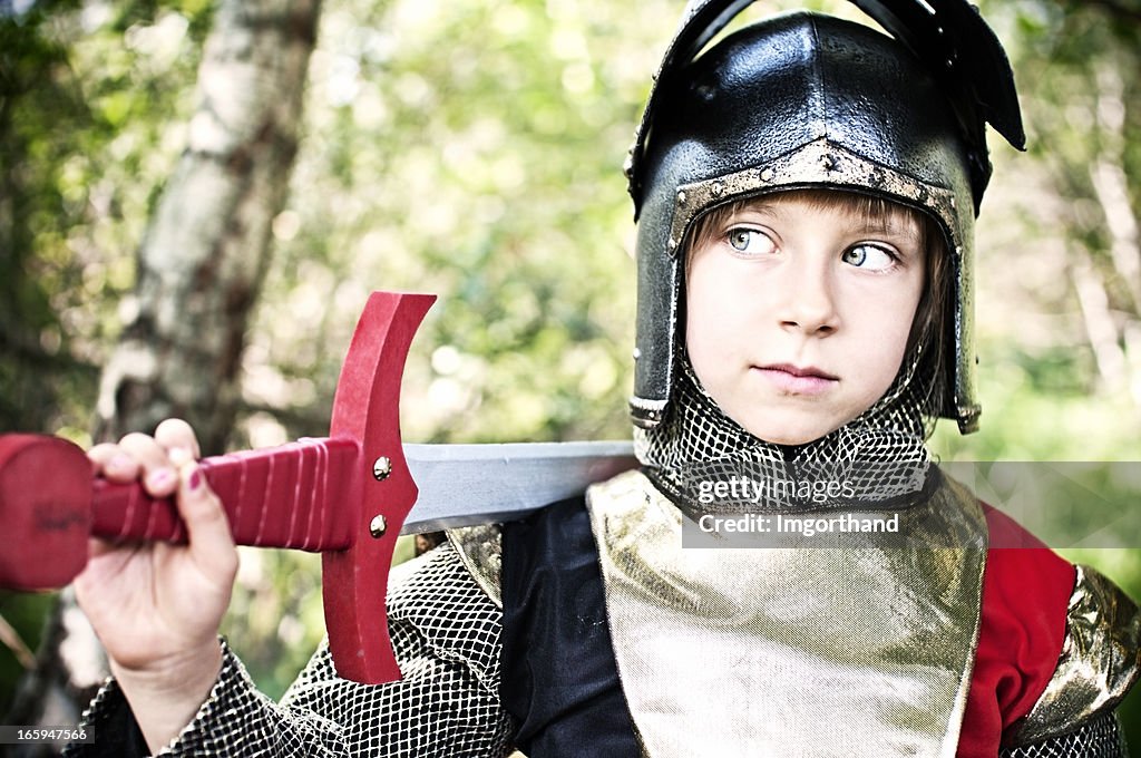 Little knight in woods