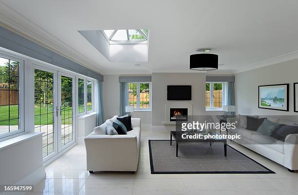 bright sitting room - glass ceiling stock pictures, royalty-free photos & images