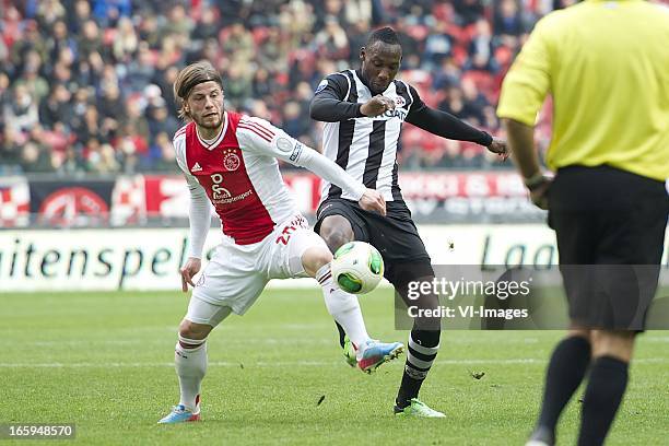 Lasse Schone of Ajax, Geoffrey Castillion of Heracles Almelo during the Dutch Eredivisie match between Ajax Amsterdam and Heracles Almelo at the...