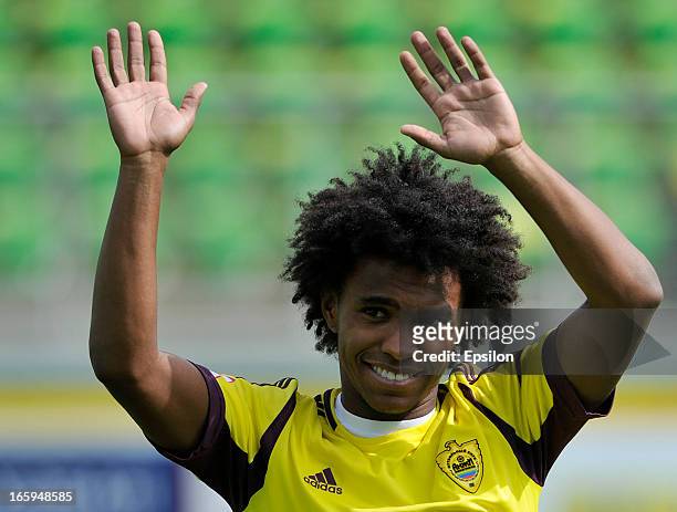 Willian of FC Anzhi Makhachkala acknowledges fans before the start of the Russian Premier League match between FC Anzhi Makhachkala and FC Alania...