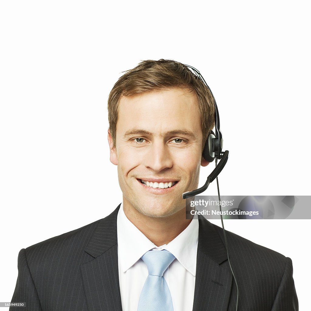 Businessman Wearing a Telephone Headset - Isolated