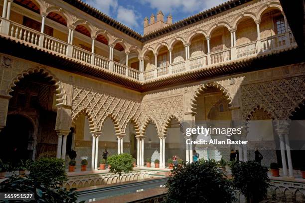 'courtyard of the maidens' at real alcazar - seville palace stock pictures, royalty-free photos & images