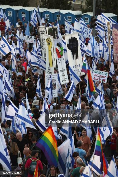 People attend a protest outside the Supreme Court in Jerusalem against the Israeli government's judicial overhaul plan on September 11, 2023.