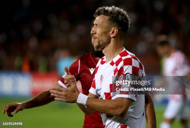 Ivan Perisic of Tottenham Hotspur speaks with Bastian Schweinsteiger  News Photo - Getty Images