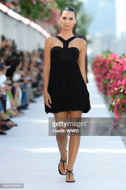 Emily Ratajkowski on the runway at Michael Kors Spring 2024 Ready To Wear Fashion Show at Domino Park on September 11, 2023 in Brooklyn, New York.