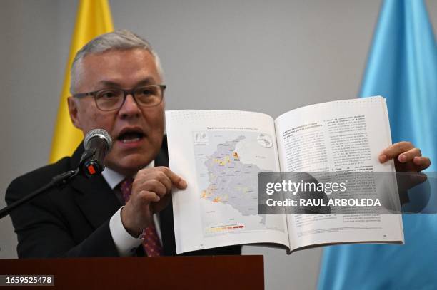 Colombian Justice Minister, Nestor Osuna, speaks during the presentation of the annual report on the monitoring of territories affected by illicit...