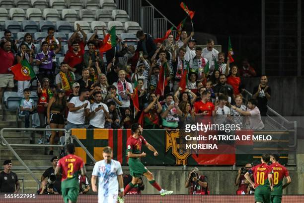 Portugal's defender Goncalo Inacio celebrates after scoring his team's first goal during the EURO 2024 first round group J qualifying football match...