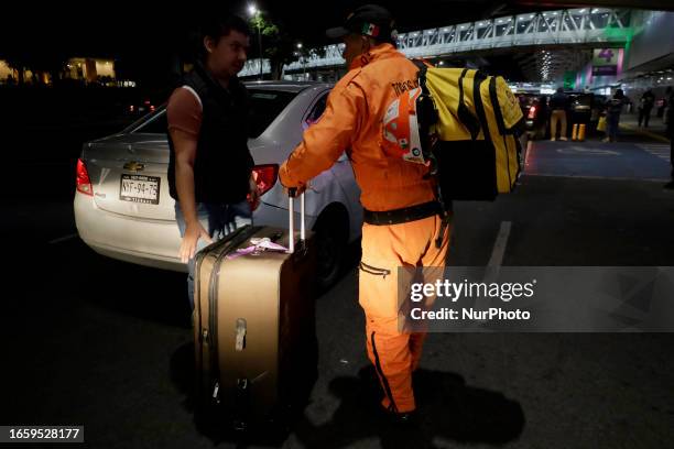 Héctor Méndez, better known as El Chino, head and founder of the Azteca Topos International Rescue Brigade, arrives at the Mexico City International...